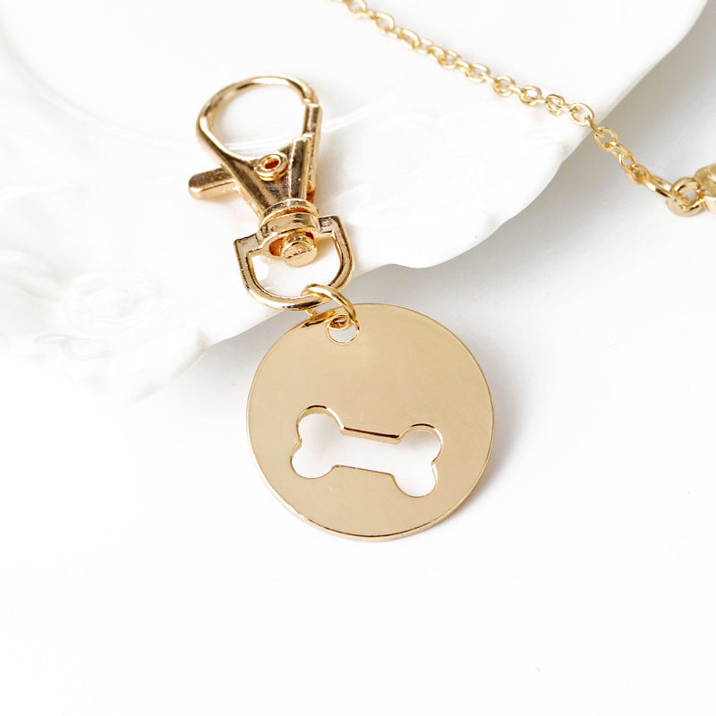 Set de Collar y Llavero con Diseño de Hueso
