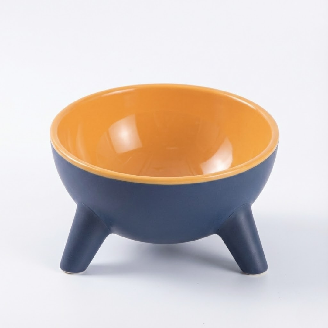 Comedero elevado inclinado para perros con base estable y material PET